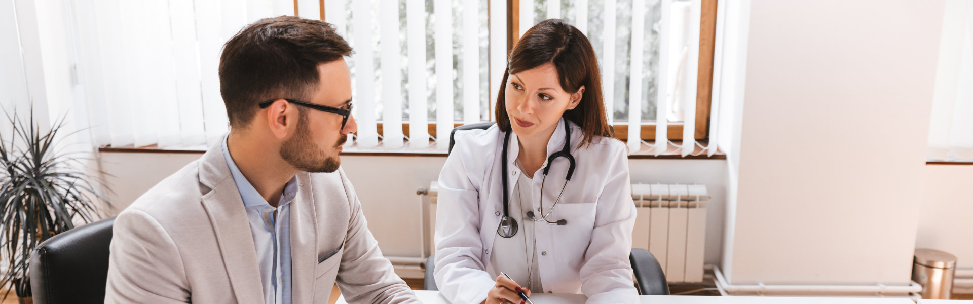 male and female doctor talking